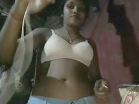 Cute girl recording a video for her partner's pleasure