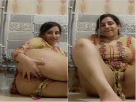 Pretty girl masturbating with her fingers