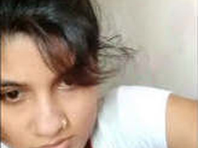 Desi babe pleasures herself with her fingers in village setting