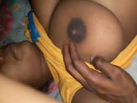 Tamil wife fondles her boobs in a steamy video