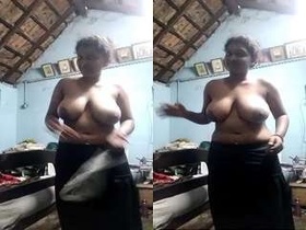 Indian Tamil girl flaunts her large breasts