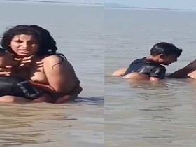 Desi country girl gives a blowjob and gets fucked in the river