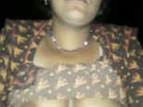 Desi wife with big tits moans in clear sound while pressing on dick disposal