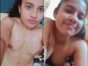 Young college girl flaunts her body in a steamy video