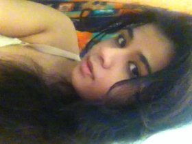 Tamil babe bares her breasts and masturbates