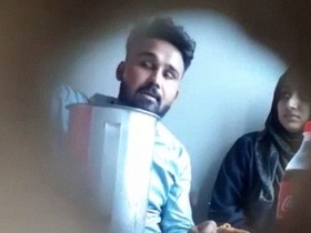 Mallu's girlfriend gives her a tit job in a restaurant