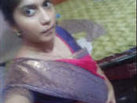 Indian girl flaunts her large breasts