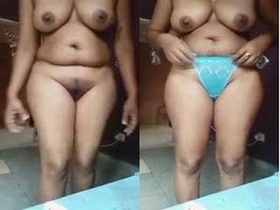 Horny girl strips and pleasures herself on camera
