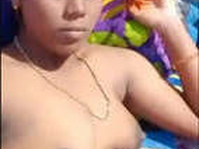 Indian woman flaunts her breasts and genitals