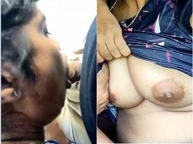 Desi girl gives a blowjob in a car while pressing her boobs