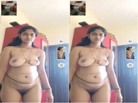 Hot Telugu bhabhi flaunts her boobs and pussy in a steamy video
