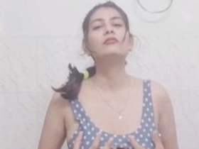 Naked Indian auntie takes a bath in front of the camera