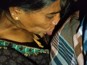 Mature Telugu wife satisfies her husband with a deepthroat blowjob at night