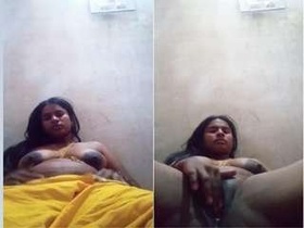 Horny Tamil bhabhi flaunts her big tits and moist pussy