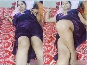 Horny Indian girl pleasures herself with tongue and fingers