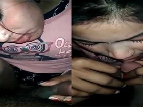 Indian woman gives a blowjob to her partner on camera