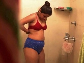Desi's roommate's hidden camera captures her bathing in sexy video