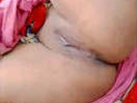 Watch a stunning Indian bhabi with a mouthwatering pussy get fucked hard