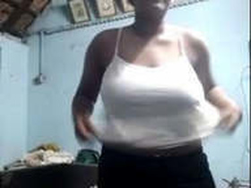 A Tamil girl shows off her big boobs in a steamy video