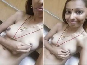 Cute Tamil girl flaunts her big boobs and pussy