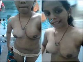 Exclusive cute Indian girl shows off her tits and pussy