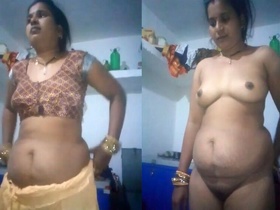 Indian village bhabhi's seductive striptease video