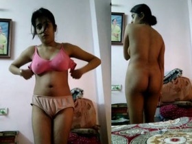 A hot European girl recording a video