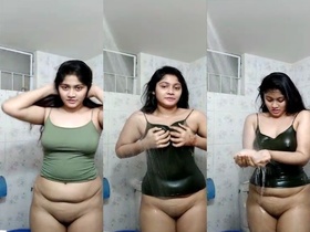 Indian girl enjoys dancing in the shower without panties on camera