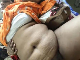 Husband licks and fingers wife's pussy in bed