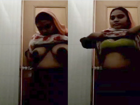 Desi bhabhi flaunts her big boobs and pussy in part 2 of the video