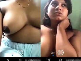A European girl flaunts her breasts during a video call