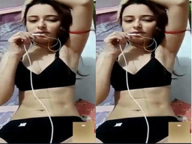 Desi Indian girl masturbates with her tits in part 1 of the video