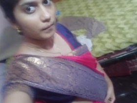A Desi girl flaunts her voluptuous breasts