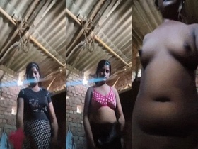 Desi girl performs a sensual striptease in Tamil video