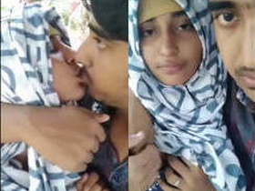 Cute hijabi girl giving head to her lover
