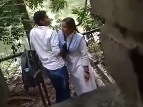 Amateur couple enjoys outdoor sex on a college campus