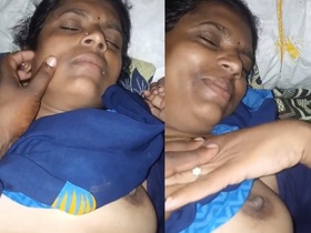 Aunty's big boobs get pressed and captured in Tamil video