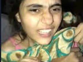 Lover squeezes girlfriend's breasts tightly