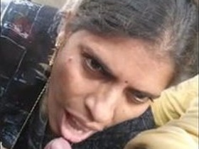 Mature Randi gives a blowjob to her client in the car
