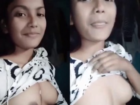 Young college student flaunts her tight breasts