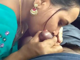 Bhabhi gives her lover a handjob and a kiss in the car