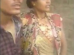A desi bhabi is caught with her young devar in a rural setting