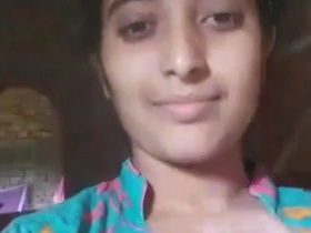 Watch as a stunning beauty flaunts her sexy pussy in a village setting