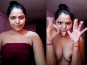 Cute girlfriend goes nude in front of camera