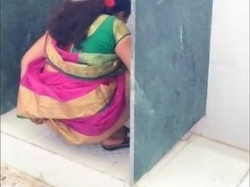 South Indian Bhabhi's pee play in a steamy video clip