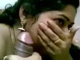 Shy south Indian wife giving a hot blowjob