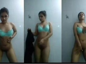 Indian teen performs an amazing solo masturbation show in a bathroom