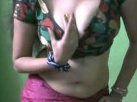 Bhabhi's seductive dance showcasing her perfect assets and ample bosom