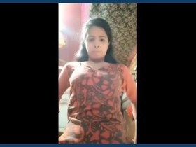 A stunning village girl reveals her body