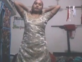 Wife in sexy clothing gets wet in the shower